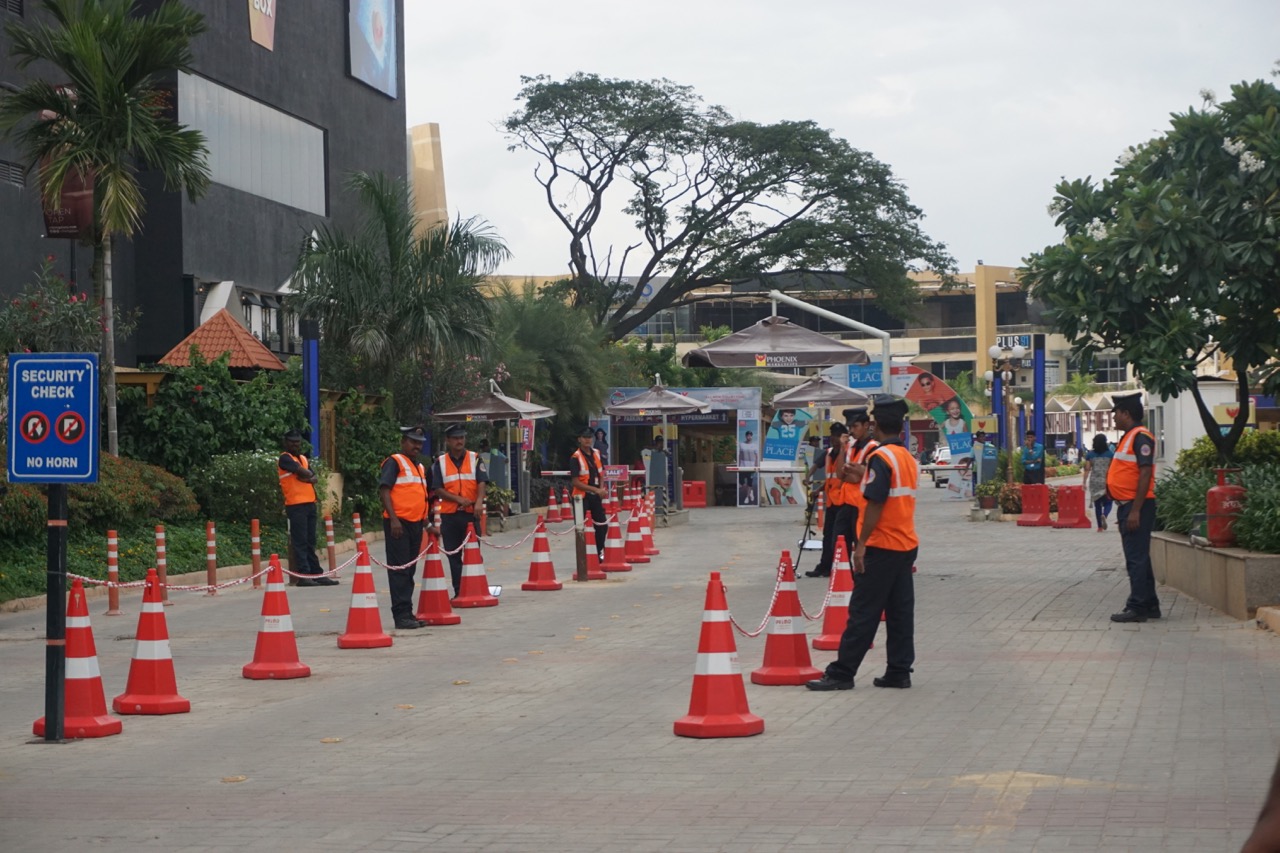 The mall security was getting ready for the Saturday Night onslaught.